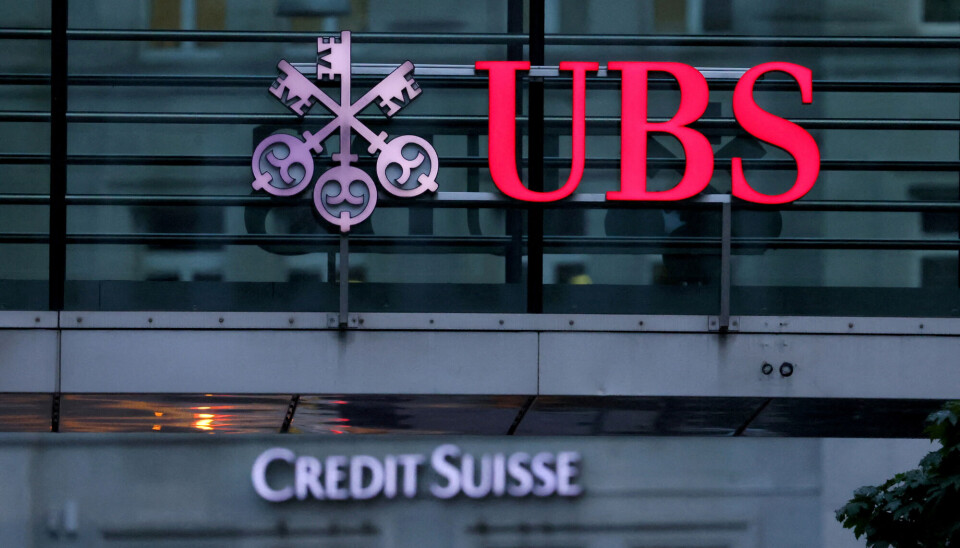 FILE PHOTO: Logos of Swiss banks Credit Suisse and UBS are seen before a news conference in Zurich Switzerland, August 30, 2023. REUTERS/Denis Balibouse/File Photo