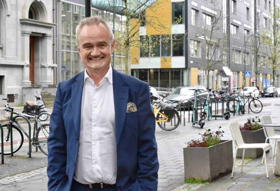 Jan-Frode Janson, konsernsjef i Sparebank 1 SMN, med bankens hovedkontor i bakgrunnen. Jan-Frode Janson, konsernsjef i Sparebank 1 SMN